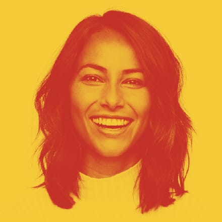 A woman shown with a magenta overlay against a yellow background.