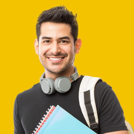 A young adult student carrying a bookbag and notebooks.