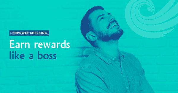 A young man standing in front of a brick wall with a happy expression. To his left, the words: Earn rewards like a boss.