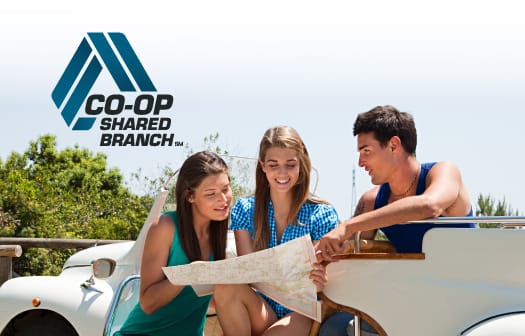 Three young people looking at a map with the CO-OP Shared Branch logo over them.