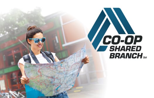 A woman wearing blue sunglasses holding a map to the left of the CO-OP Shared Branch logo.