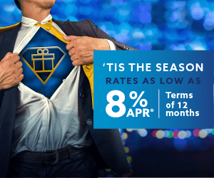 A man stretching open his sports coat and shirt revealing an icon of a present. To the right, the words: Tis the season. Rates as low as 8% APR. Terms of 12 months.
