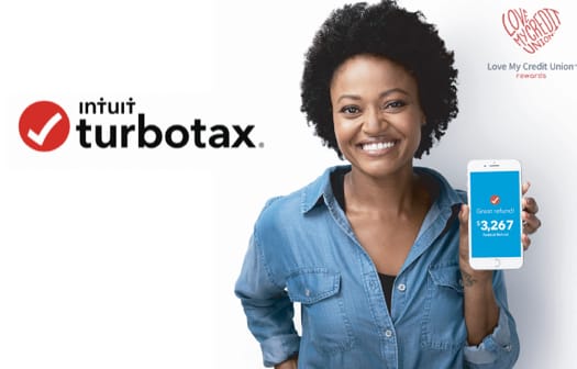 A woman holding a smart phone with the turbotax app open.