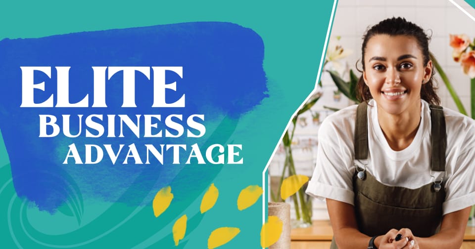 A hand inserting a card into a POS card reader at a checkout counter.