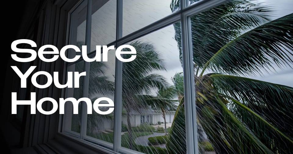 A hand sketching a modern living room. To the left, the words: Don't Move. Improve.