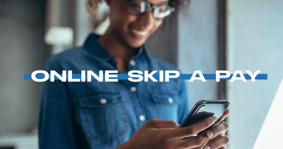 A young woman using a smartphone. Across the middle, the words: online skip a pay.